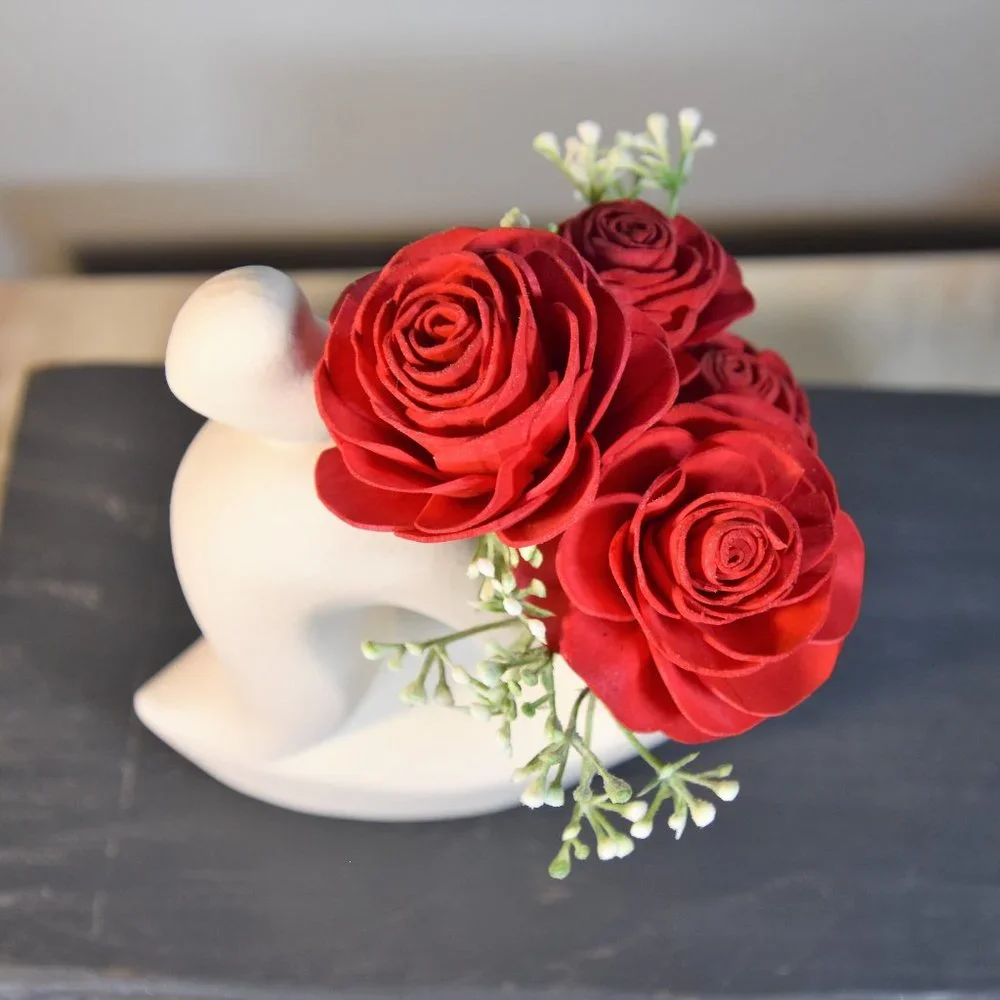 Sexy white curvy hearts vase with 4 red Sola wood roses that will last forever!